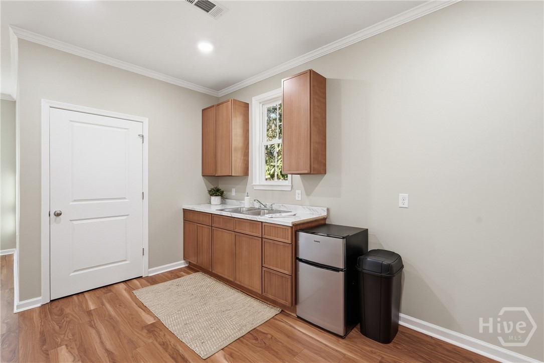 1014 Wilmington Island Road Savannah, GA 31410 - Photo 29 of 58 GARAGE APT kitchenette, and walk in lauundry center