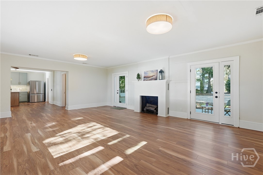 1014 Wilmington Island Road Savannah, GA 31410 - Photo 9 of 58 Living room with fireplace