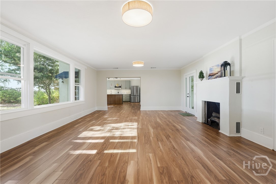 1014 Wilmington Island Road Savannah, GA 31410 - Photo 10 of 58 Living room open to kitchen/dining