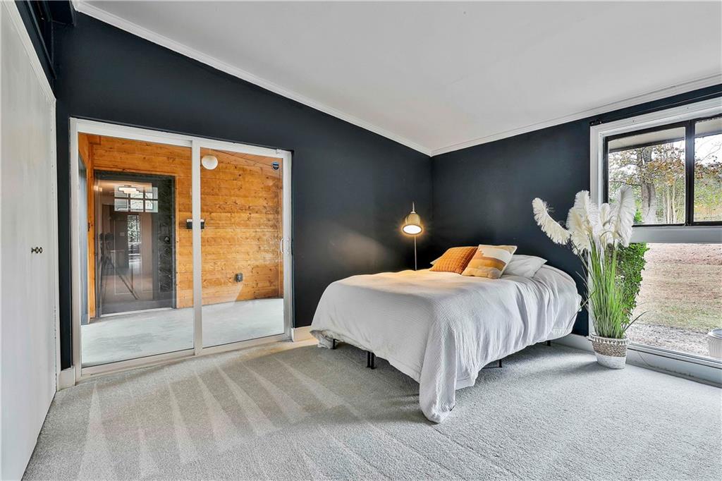 511 East Boyd Road Hogansville, GA 30230 - Photo 12 of 28 a bedroom with a bed and a window