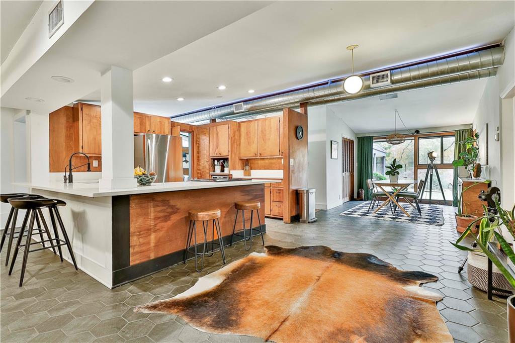 511 East Boyd Road Hogansville, GA 30230 - Photo 7 of 28 a view of kitchen with stainless steel appliances granite countertop sink stove and cabinets