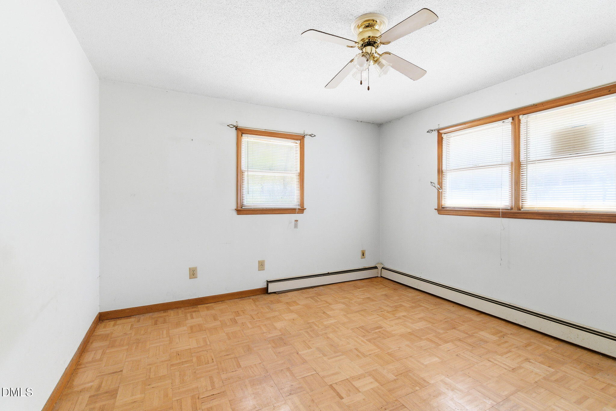 1603 Sykes Road Mebane, NC 27302 - Photo 26 of 45 an empty room with windows and fan