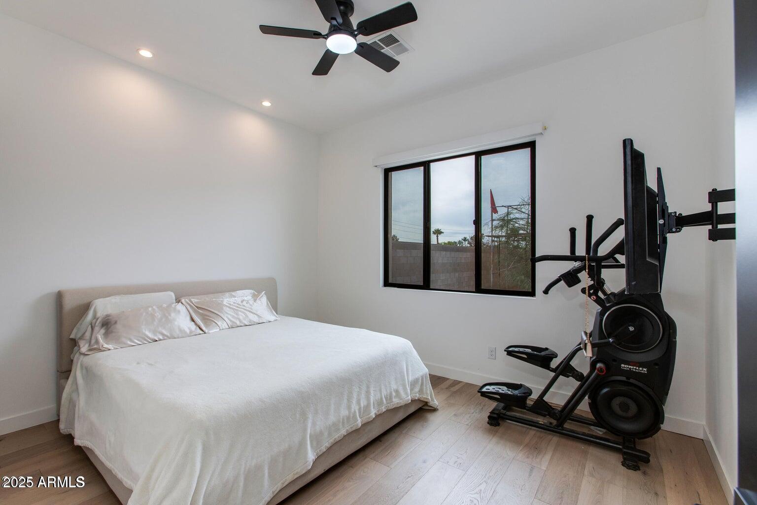 100 West Northern Avenue, Unit 17 Phoenix, AZ 85021 - Photo 15 of 20 a bedroom with a bed and a window
