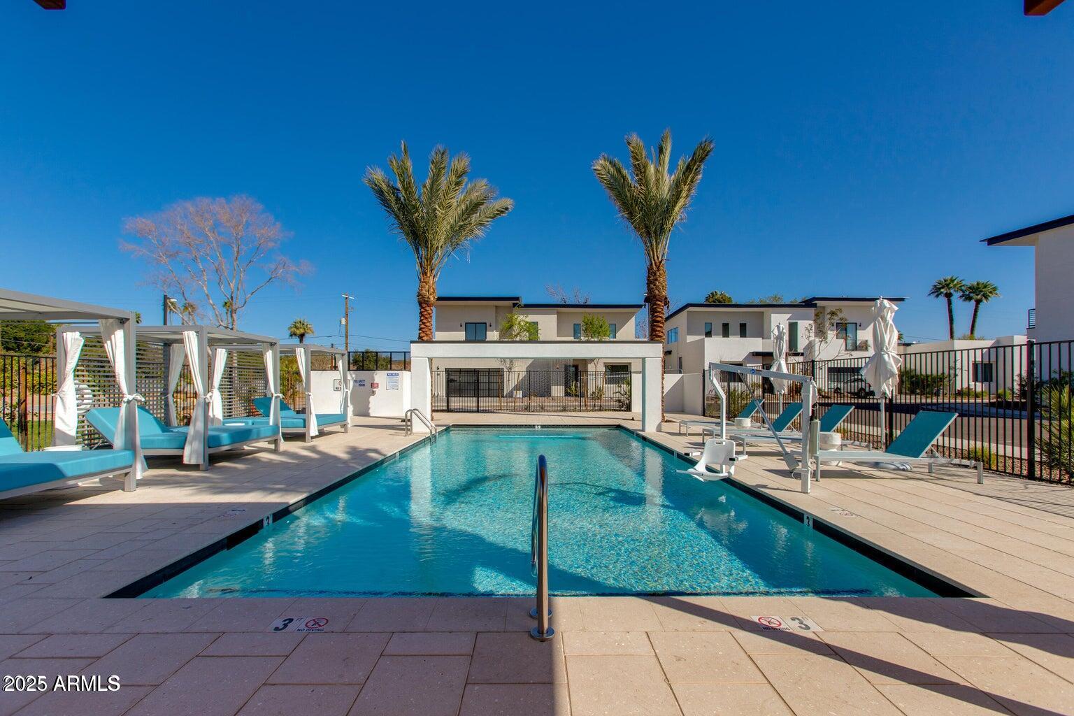 100 West Northern Avenue, Unit 17 Phoenix, AZ 85021 - Photo 20 of 20 a view of a swimming pool with a patio