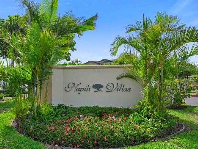 46 Polohina Lane, Unit 5 Lahaina, HI 96761 - Photo 10 of 10 a sign that is sitting on a brick wall