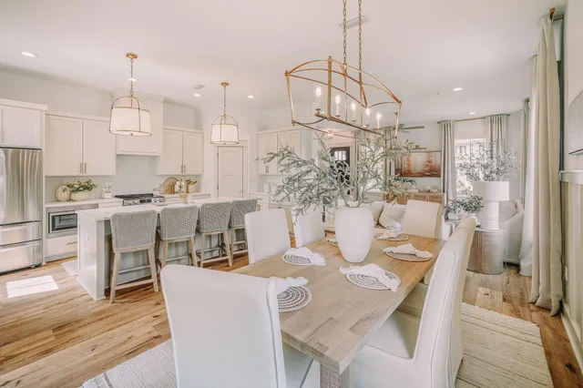 a bedroom with a bed and a potted plant