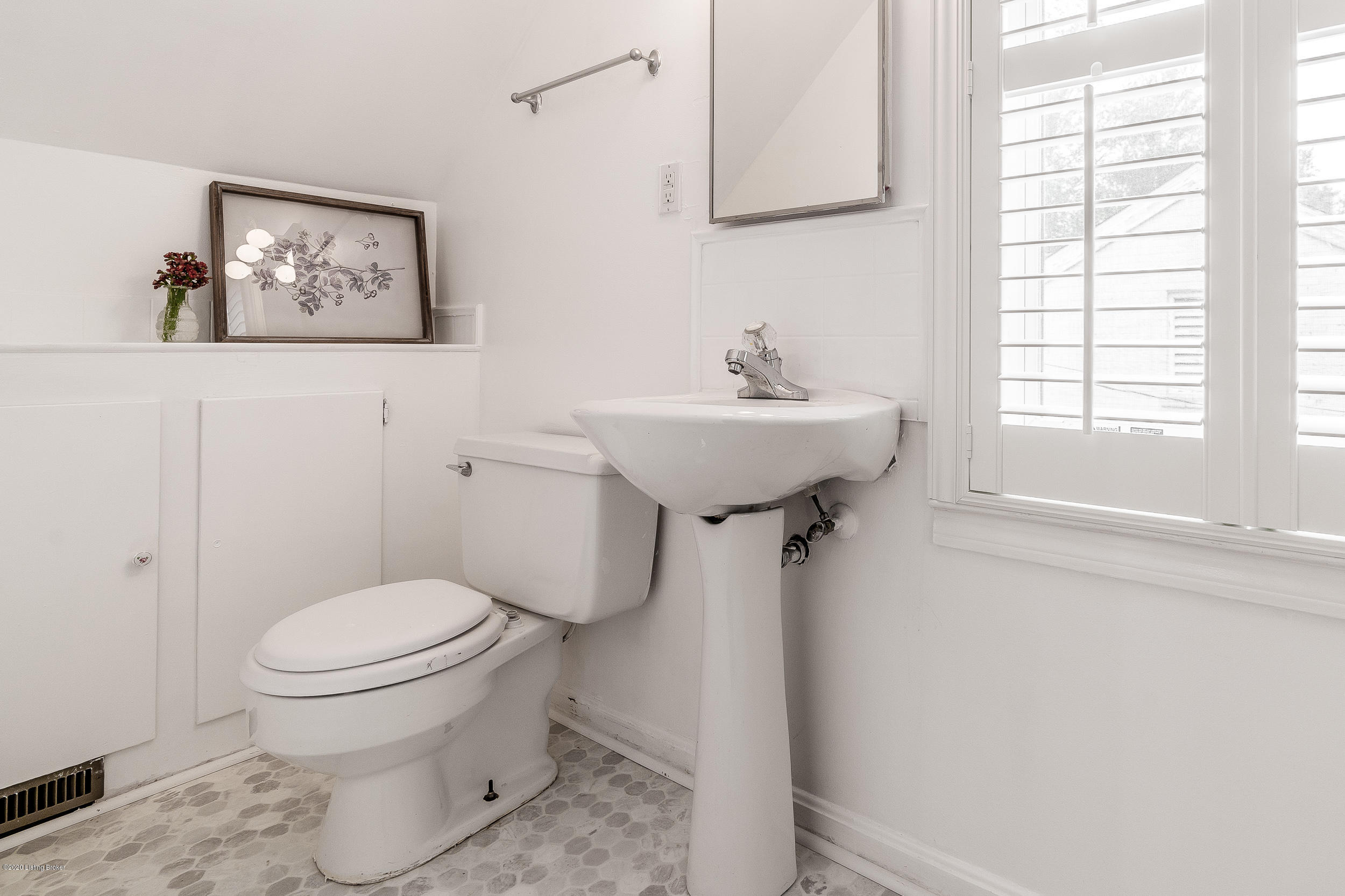 367 Ridgeway Avenue Louisville, KY 40207 - Photo 32 of 47 Classic second floor full bath with built in cabinets, fresh paint and planation shutters.