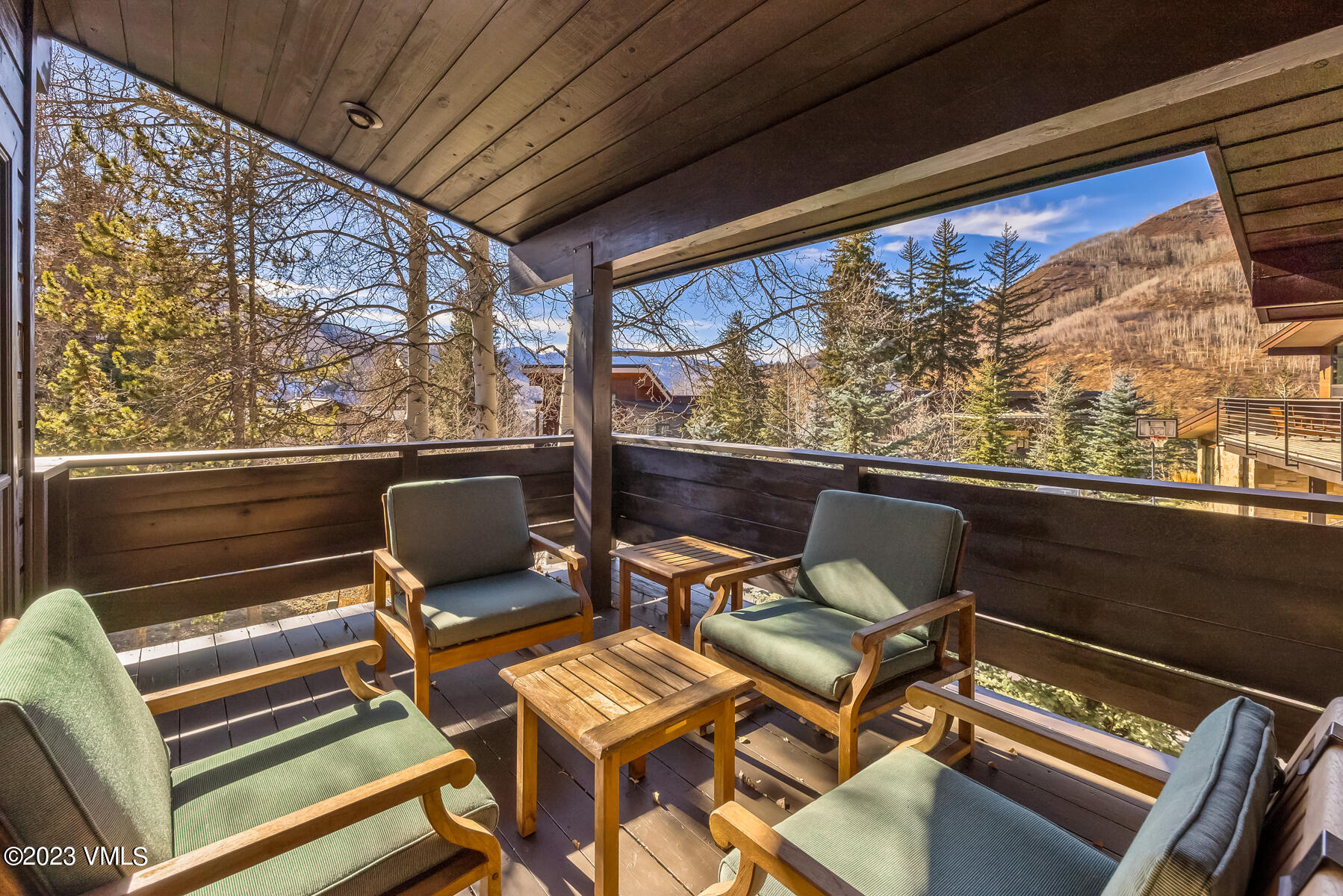 736 Sandy Lane, Unit 1 Vail, CO 81657 - Photo 13 of 36 a view of a chairs and table in a balcony