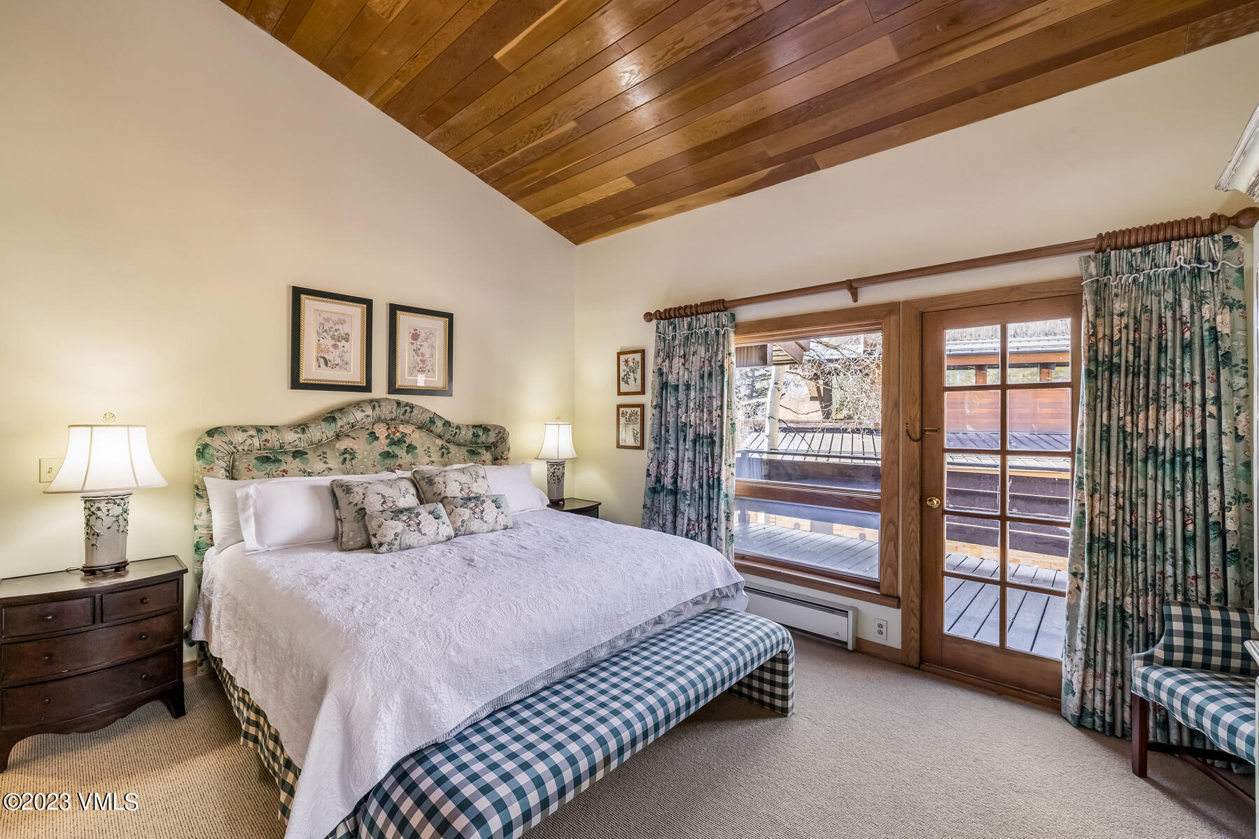 736 Sandy Lane, Unit 1 Vail, CO 81657 - Photo 17 of 36 a spacious bedroom with a bed and a walk in closet