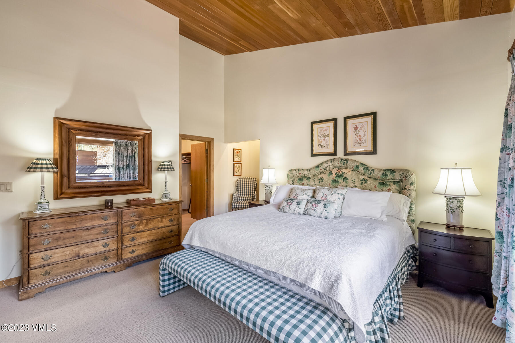 736 Sandy Lane, Unit 1 Vail, CO 81657 - Photo 18 of 36 a bedroom with a bed and a dresser