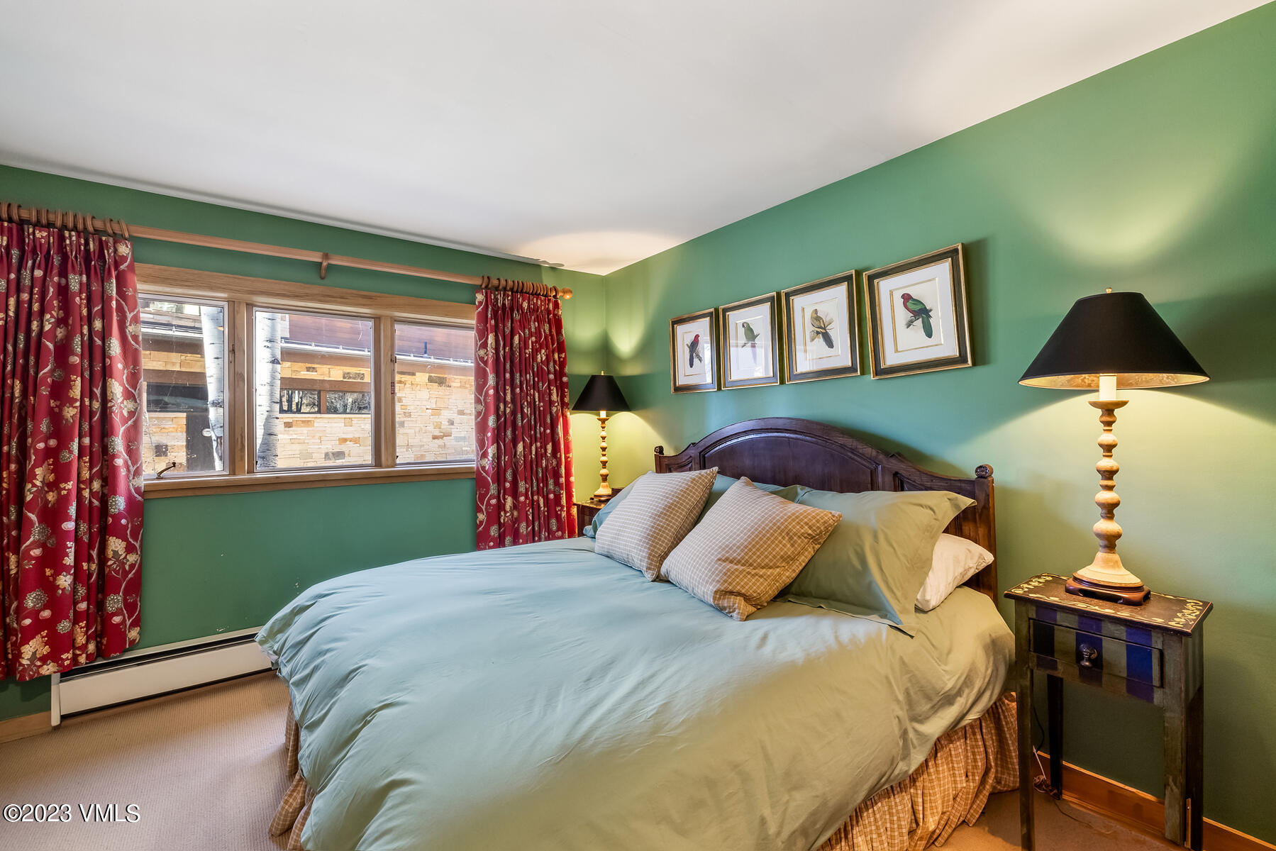 736 Sandy Lane, Unit 1 Vail, CO 81657 - Photo 23 of 36 a bedroom with a bed and a window