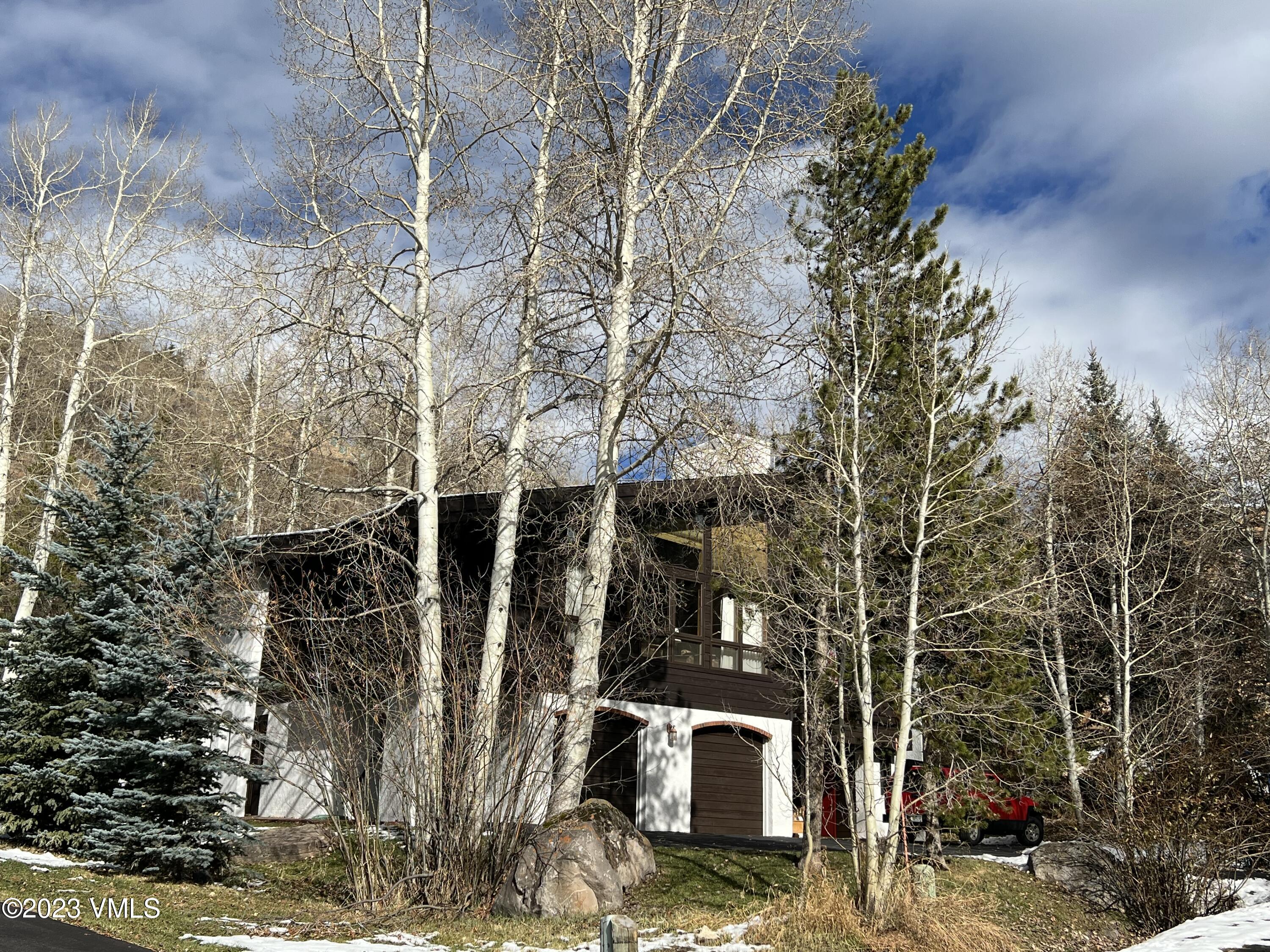 736 Sandy Lane, Unit 1 Vail, CO 81657 - Photo 33 of 36 a view of house with yard