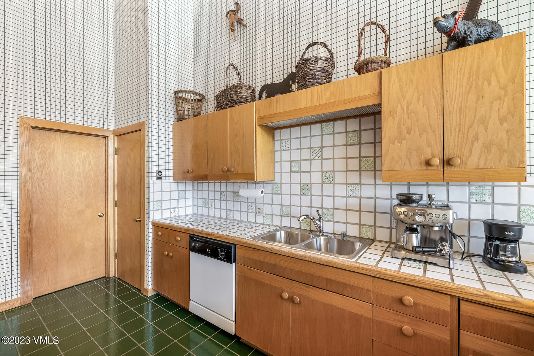 736 Sandy Lane, Unit 1 Vail, CO 81657 - Photo 10 of 36 a bathroom with a sink and a mirror