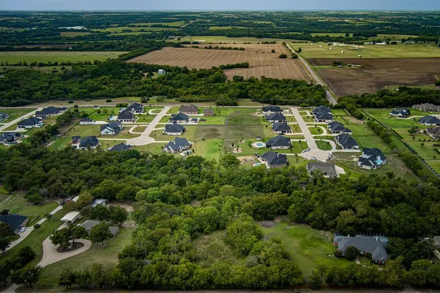 a view of a lake with a city