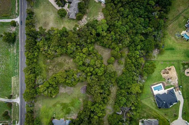 an aerial view of residential house with outdoor space