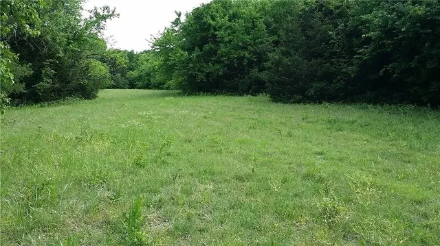 a view of an outdoor space with a lake view