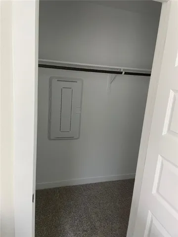 a kitchen with a sink and a refrigerator