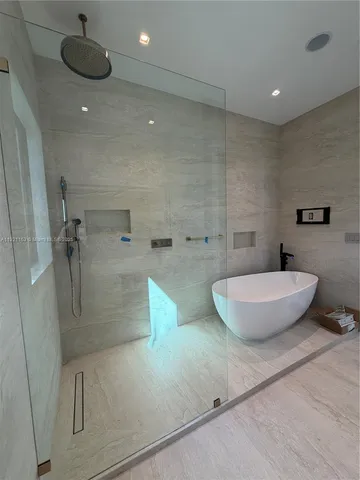 a utility room with washer and dryer