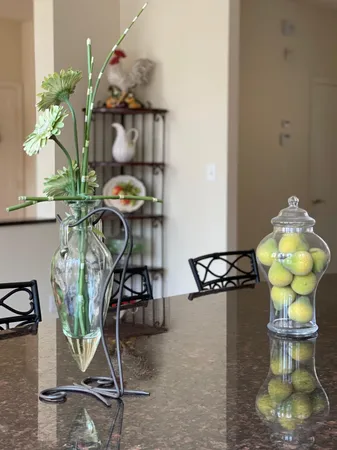 a vase of flowers sitting on a table