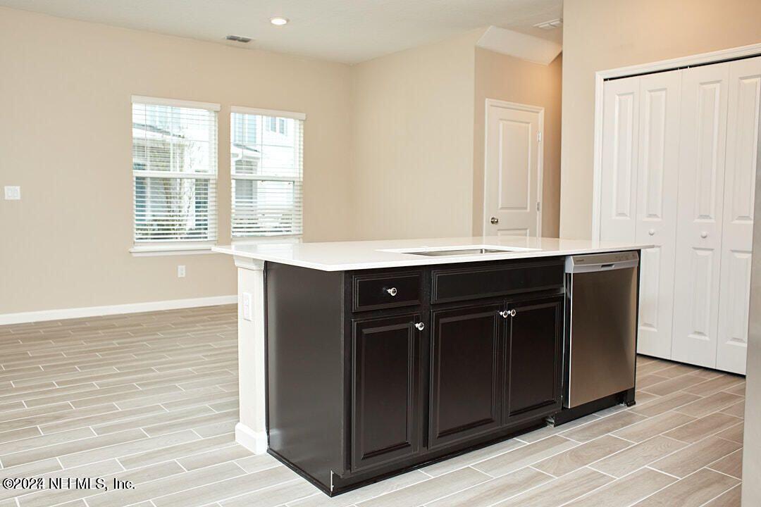 340 Boracay Circle St. Johns, FL 32259 - Photo 14 of 31 a room with a sink and a mirror