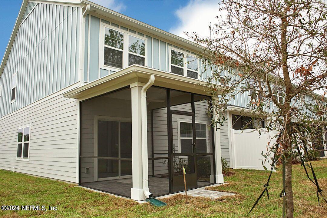 340 Boracay Circle St. Johns, FL 32259 - Photo 3 of 31 a front view of a house with a yard