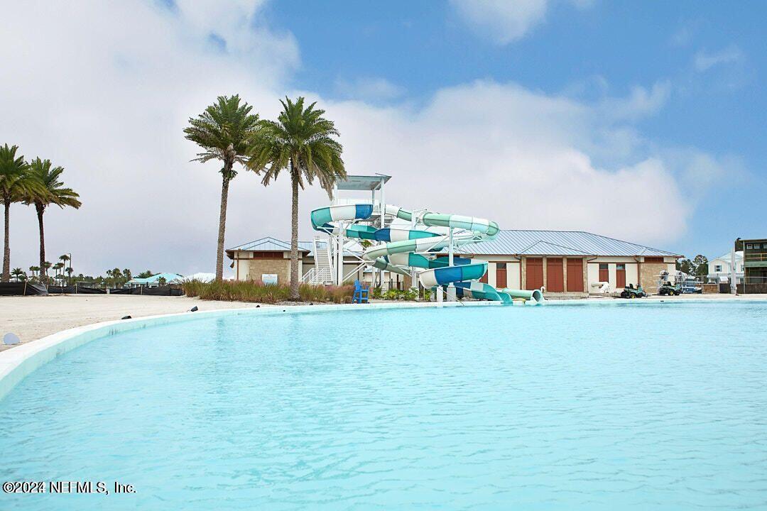 340 Boracay Circle St. Johns, FL 32259 - Photo 31 of 31 a view of swimming pool with outdoor seating and plants