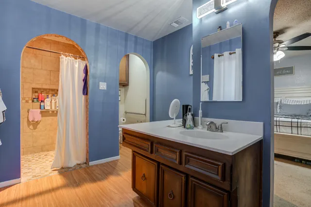 a view of bathroom with dual sinks