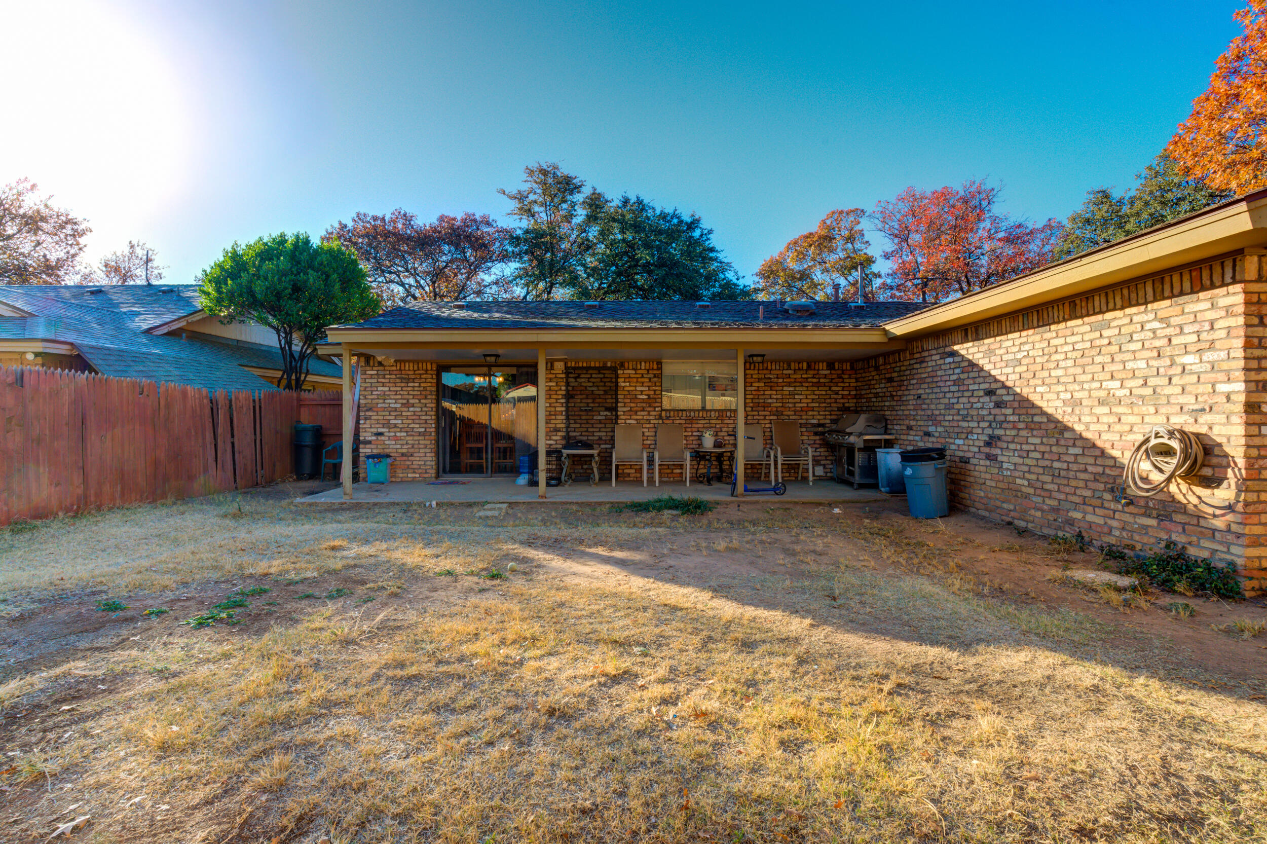 4524 79th Street Lubbock, TX 79424 - Photo 42 of 45 a front view of a house with a yard and garage