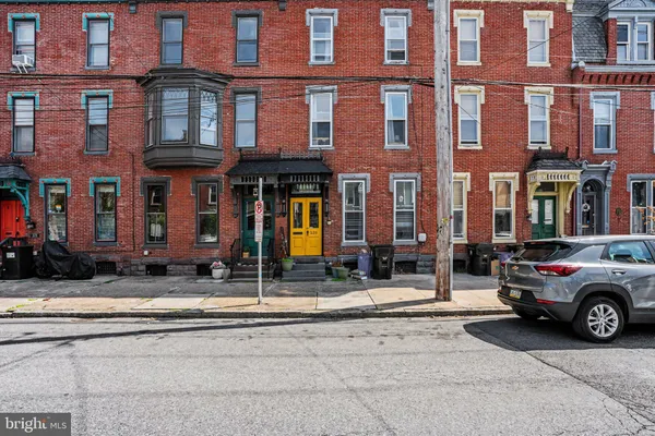 a car parked in front of a building