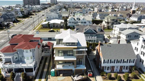 an aerial view of a building with street view