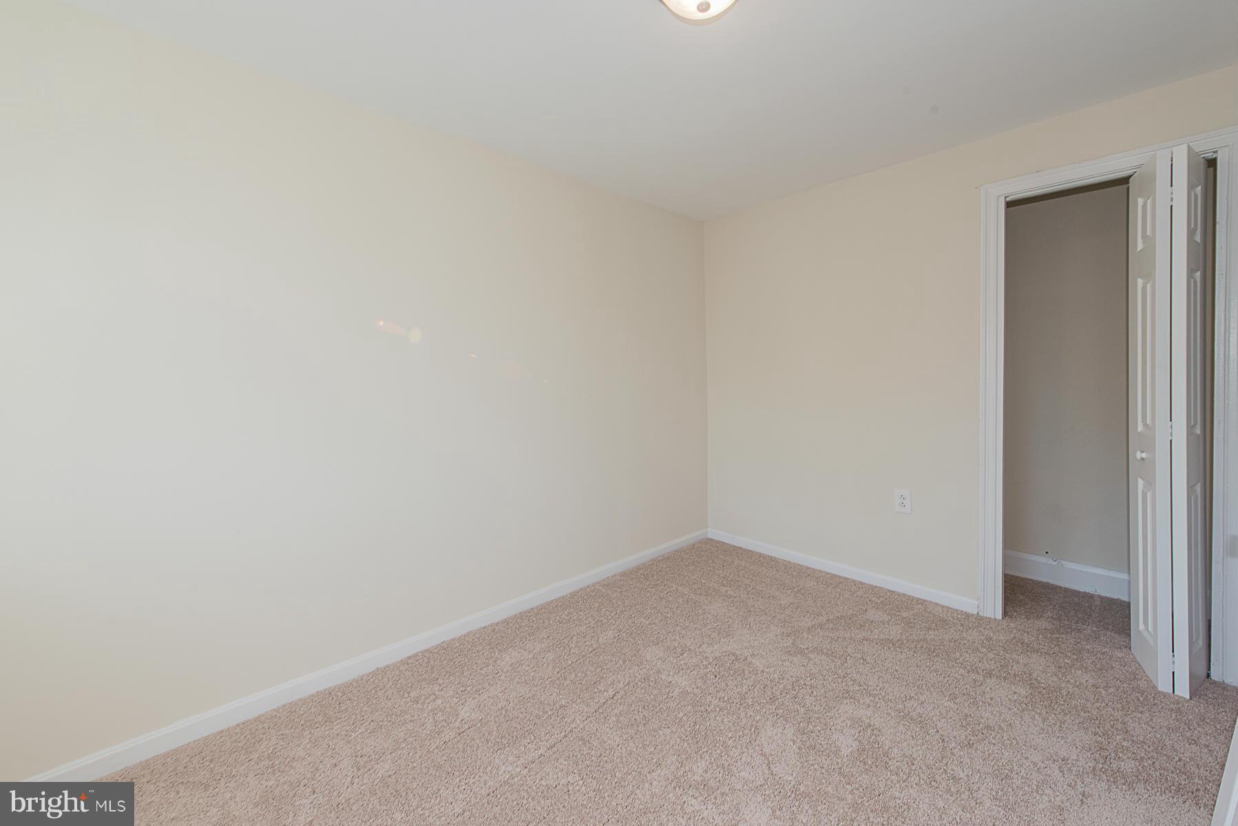 229 West Edgevale Road Baltimore, MD 21225 - Photo 7 of 13 a view of an empty room
