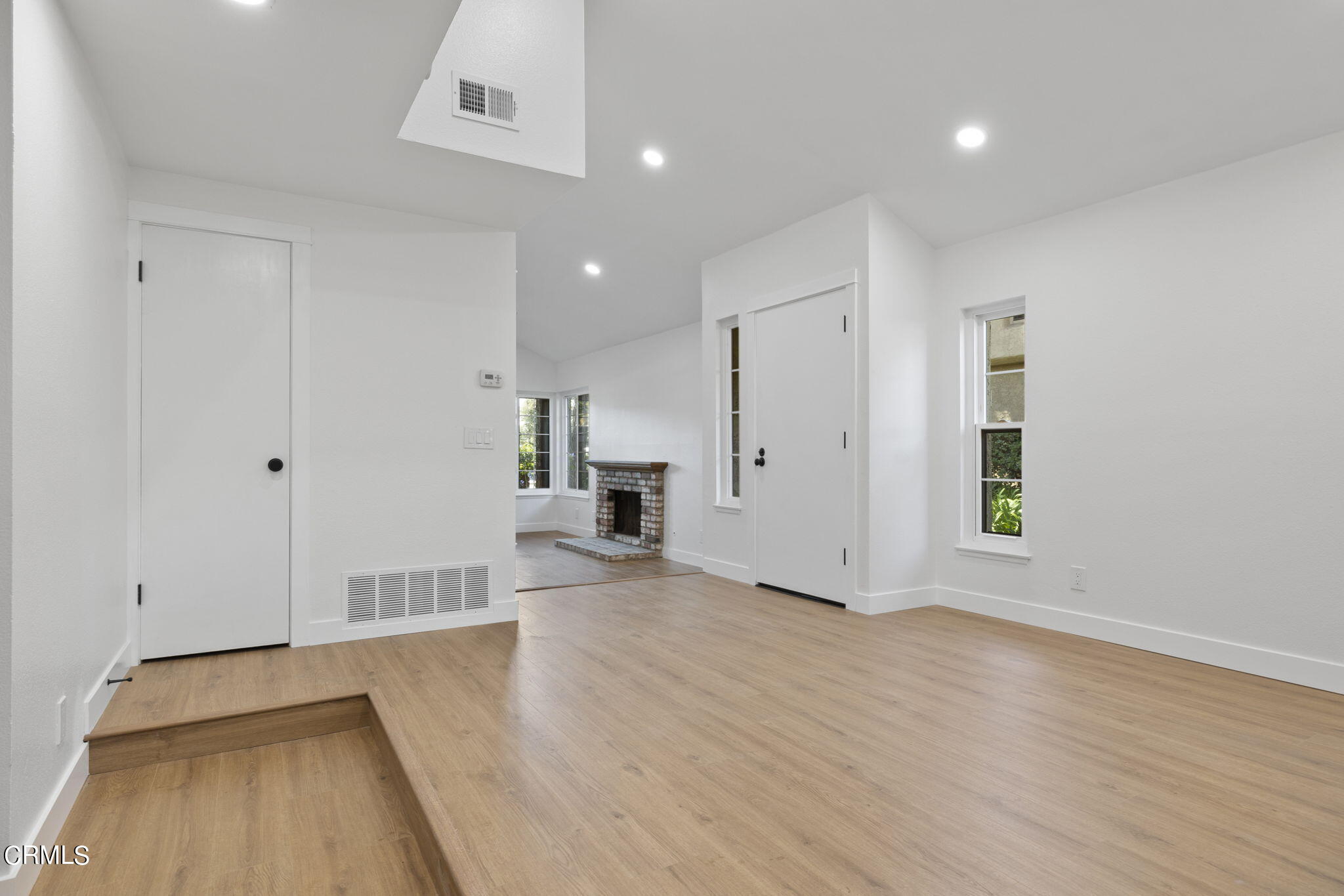 3764 Via Pacifica Walk Oxnard, CA 93035 - Photo 13 of 44 a view of empty room with wooden floor