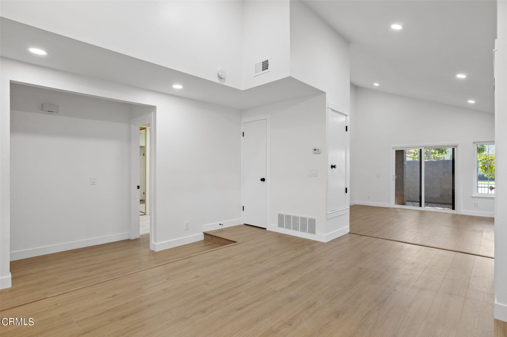 3764 Via Pacifica Walk Oxnard, CA 93035 - Photo 14 of 44 an empty room with wooden floor