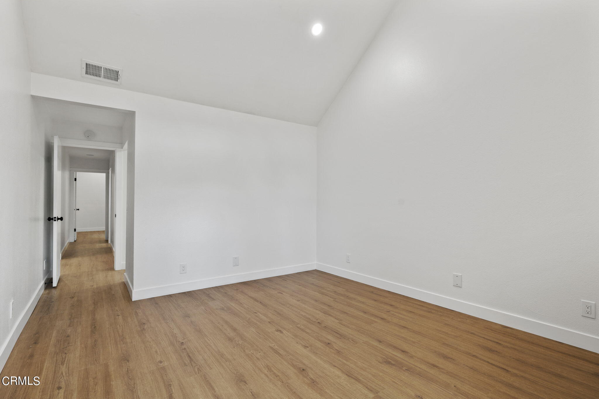 3764 Via Pacifica Walk Oxnard, CA 93035 - Photo 26 of 44 a view of a room with wooden floor