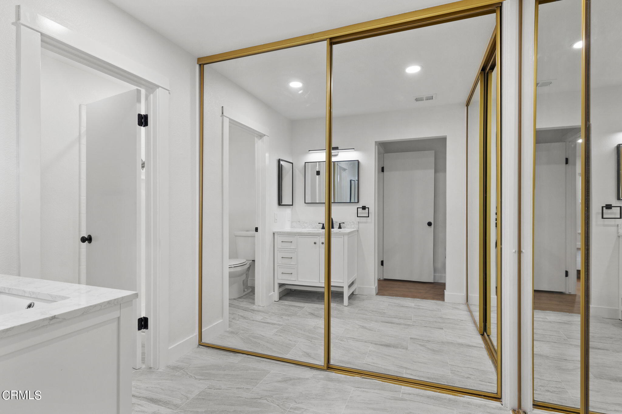 3764 Via Pacifica Walk Oxnard, CA 93035 - Photo 27 of 44 a bathroom with a shower and a sink