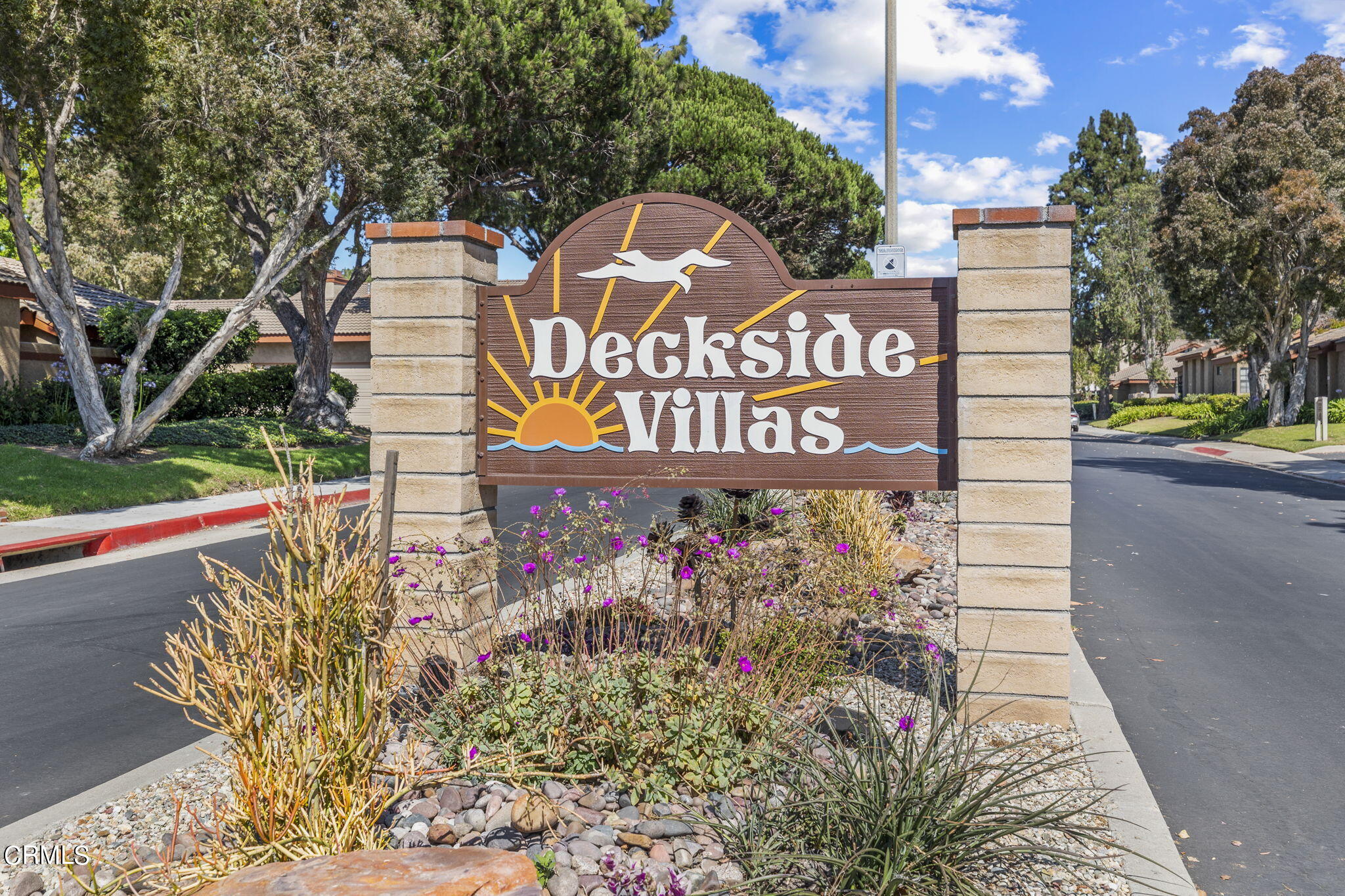 3764 Via Pacifica Walk Oxnard, CA 93035 - Photo 4 of 44 a sign on the side of a road