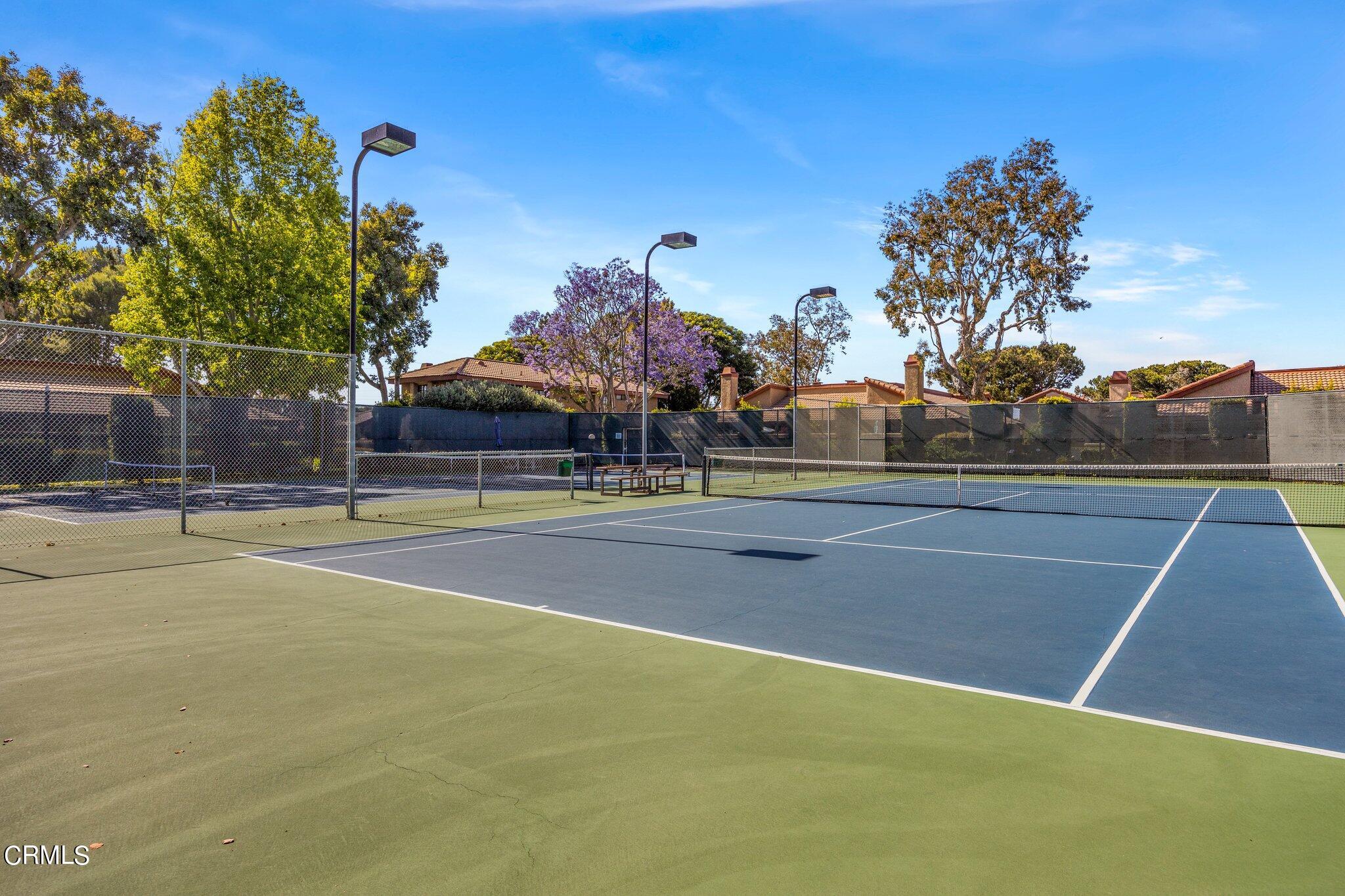 3764 Via Pacifica Walk Oxnard, CA 93035 - Photo 42 of 44 a view of a tennis court