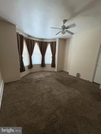 a bathroom with a tub and a shower