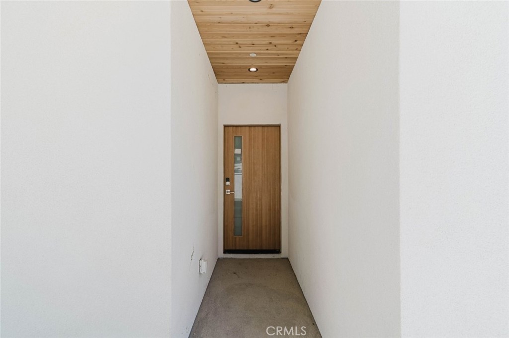 17846 Rinaldi Street Granada Hills, CA 91344 - Photo 5 of 34 a hallway with a elevator