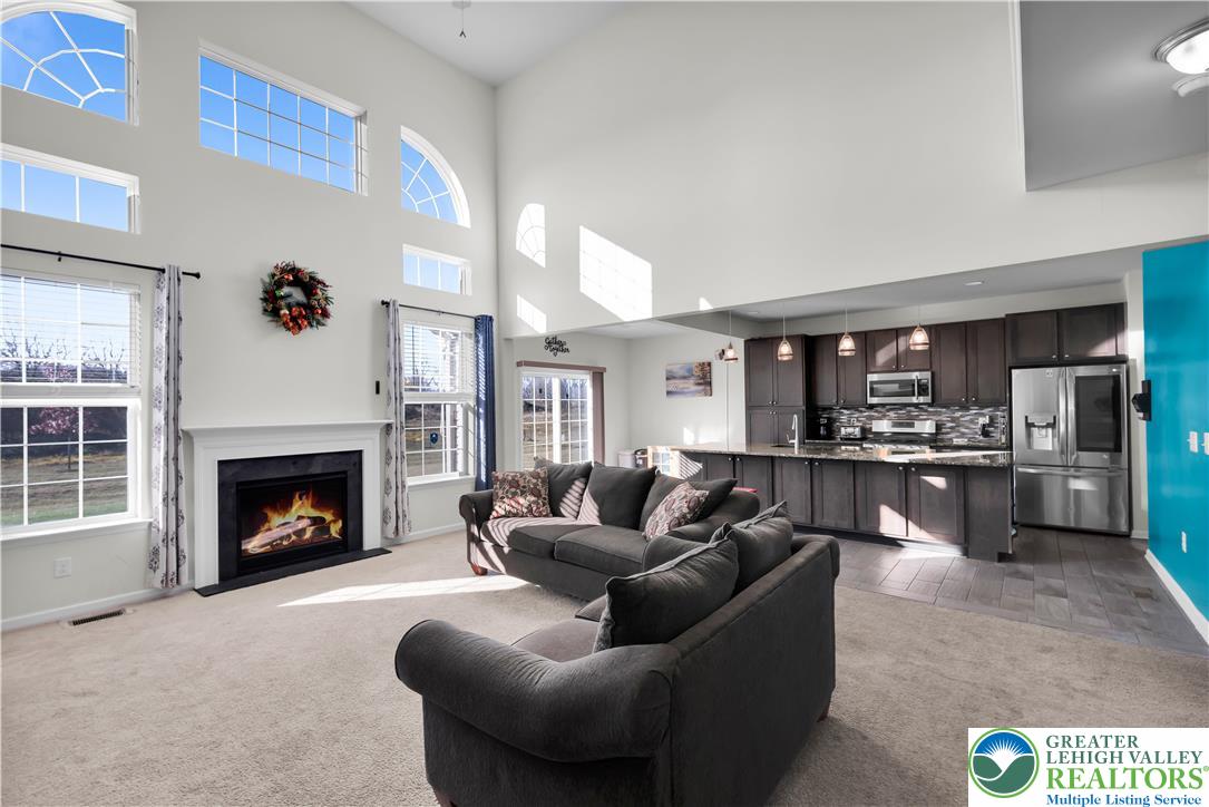 4247 Beech Drive Nazareth, PA 18064 - Photo 14 of 42 a living room with furniture and a fireplace