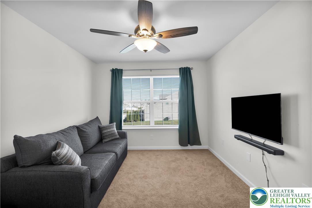 4247 Beech Drive Nazareth, PA 18064 - Photo 21 of 42 a living room with furniture and a flat screen tv