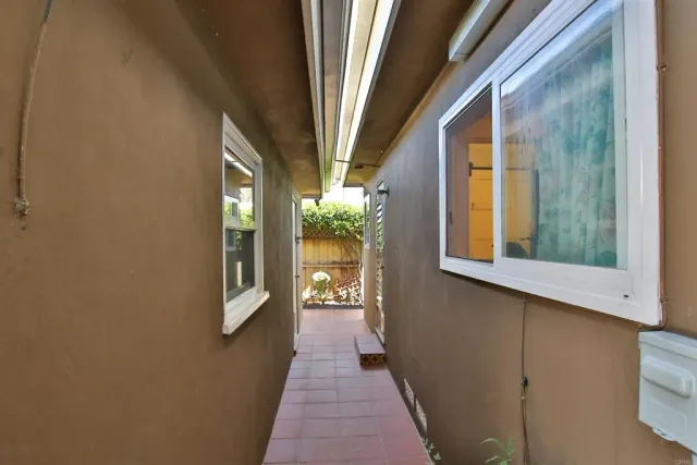 a view of a balcony with furniture