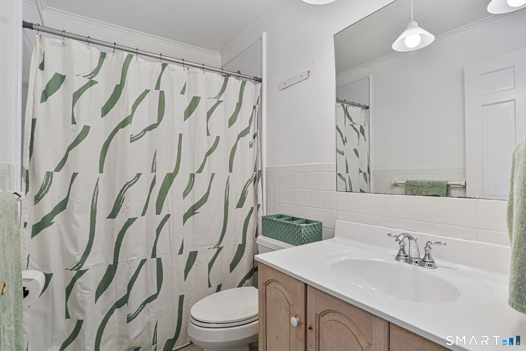 40 Rose Terrace Trumbull, CT 06611 - Photo 15 of 24 a bathroom with a granite countertop sink and a mirror