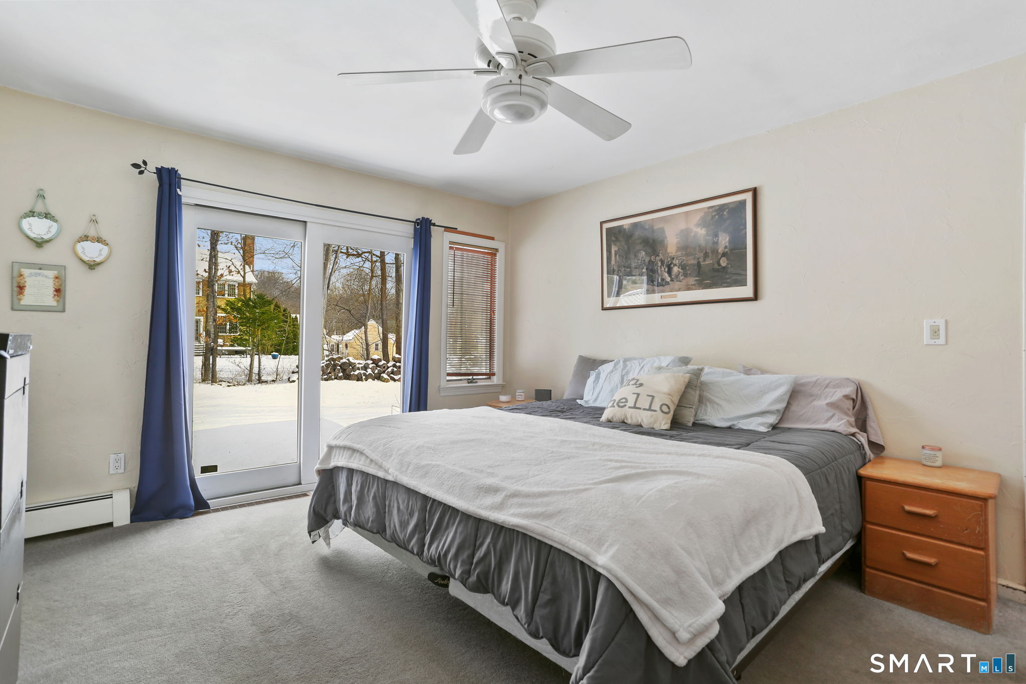 40 Rose Terrace Trumbull, CT 06611 - Photo 16 of 24 a bedroom with a bed and a painting on the wall