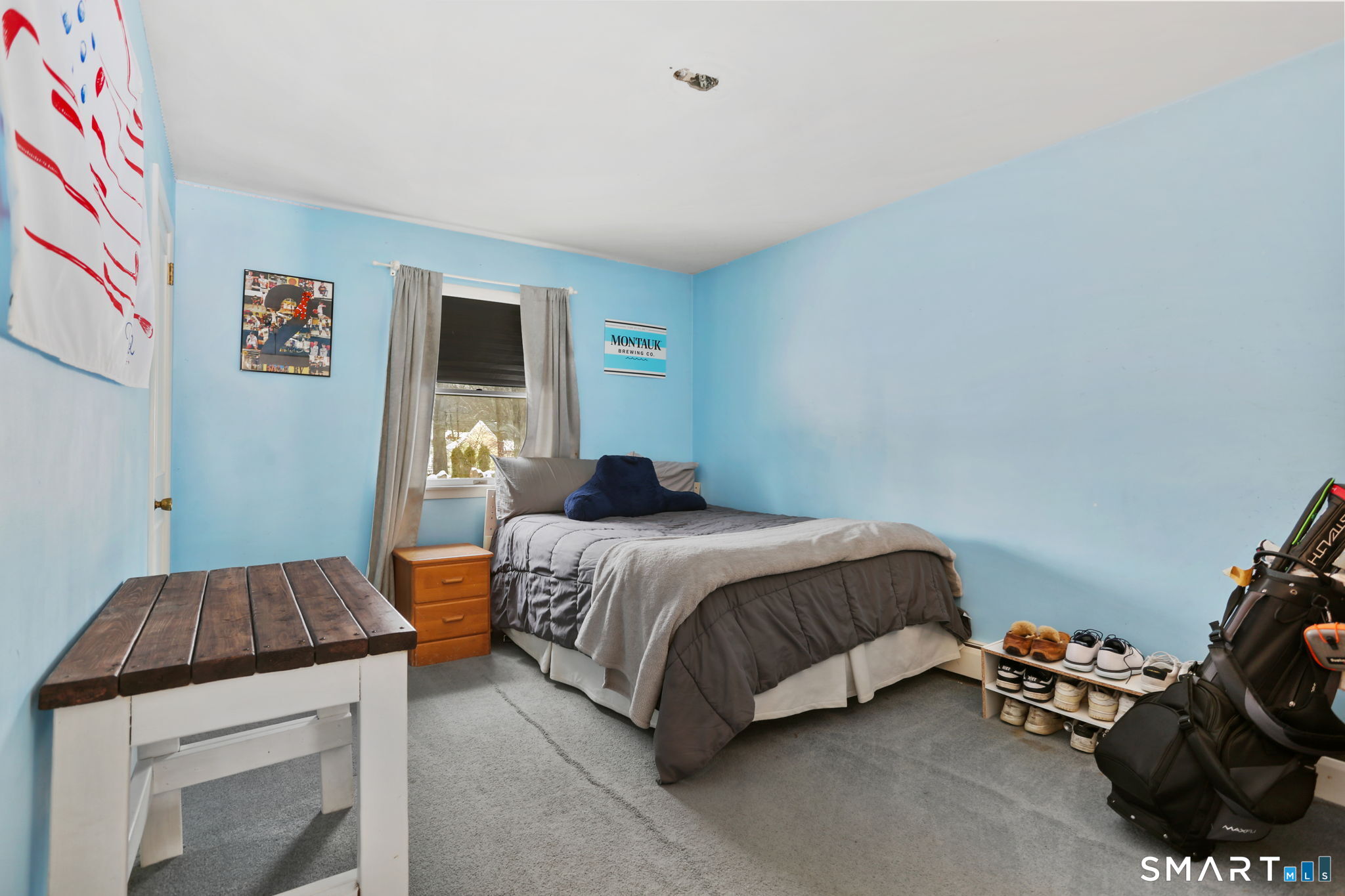 40 Rose Terrace Trumbull, CT 06611 - Photo 19 of 24 a bedroom with a bed and a window