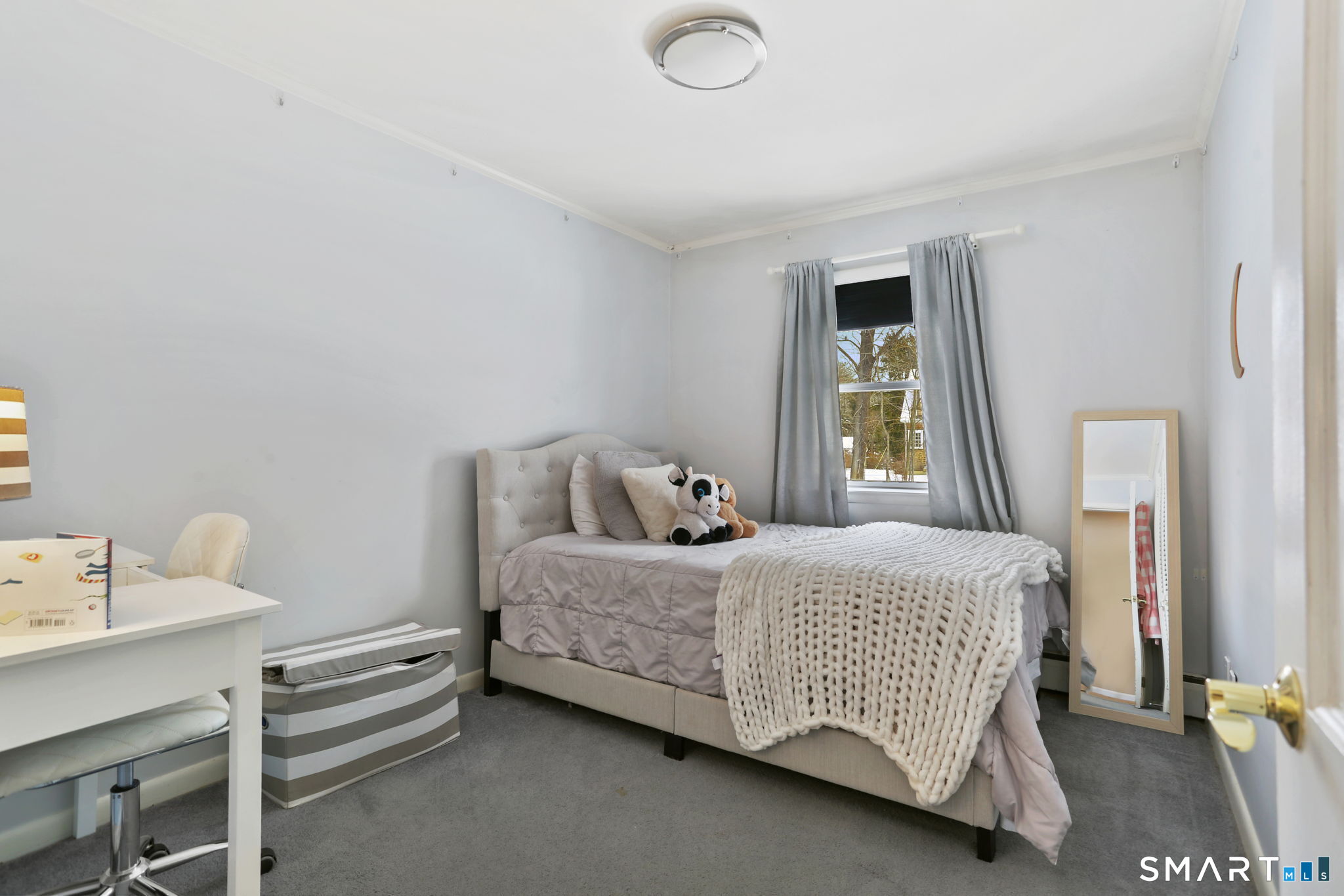 40 Rose Terrace Trumbull, CT 06611 - Photo 20 of 24 a bedroom with a bed and a window