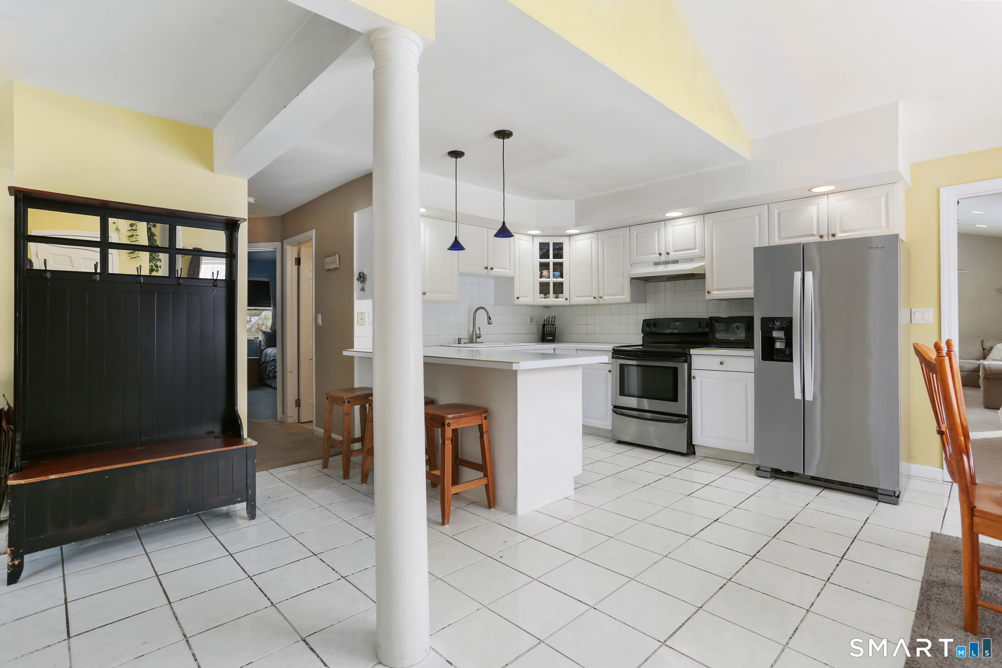 40 Rose Terrace Trumbull, CT 06611 - Photo 21 of 24 a kitchen with granite countertop a refrigerator and a stove top oven