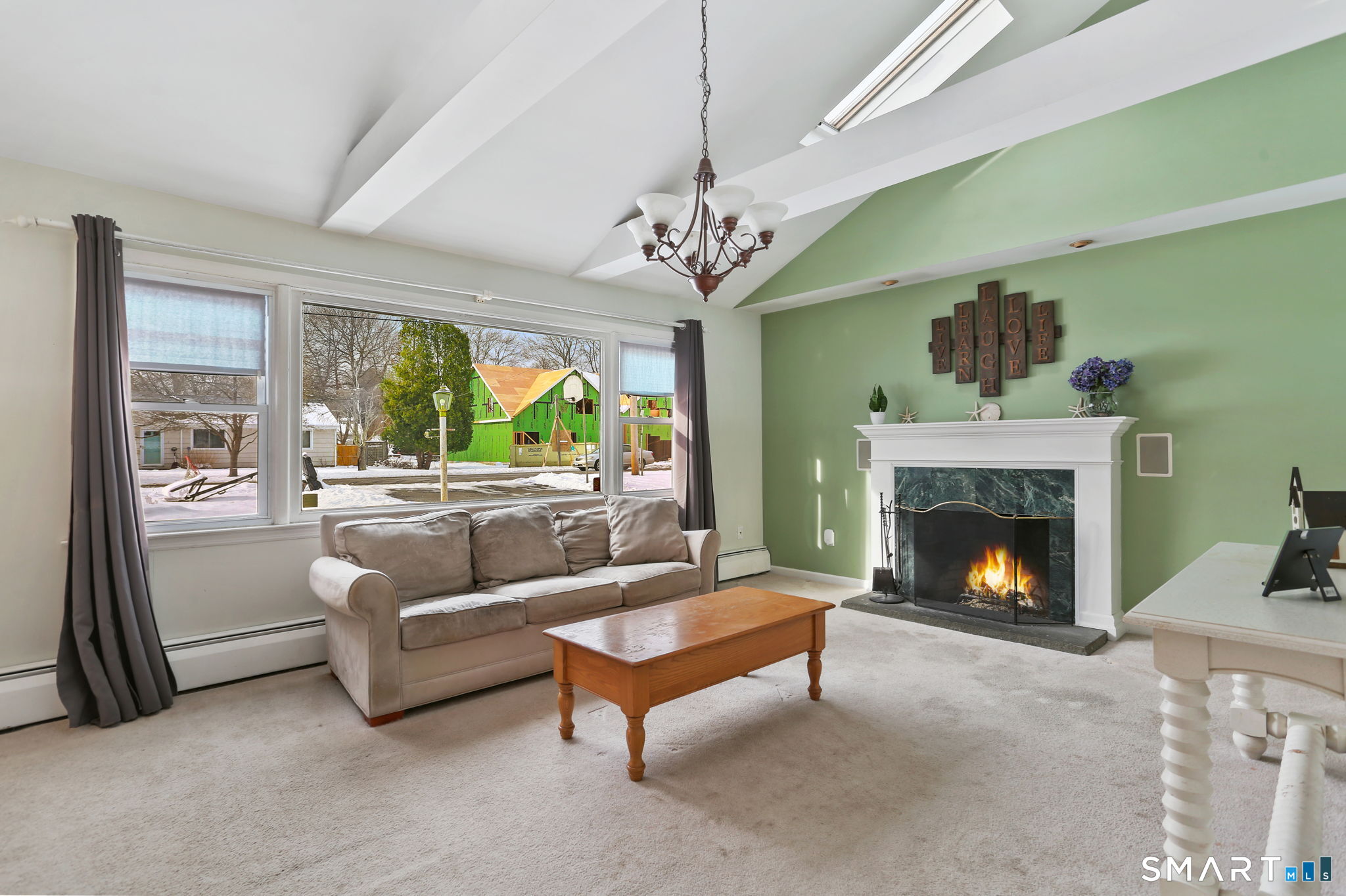 40 Rose Terrace Trumbull, CT 06611 - Photo 8 of 24 a living room with furniture and a fireplace