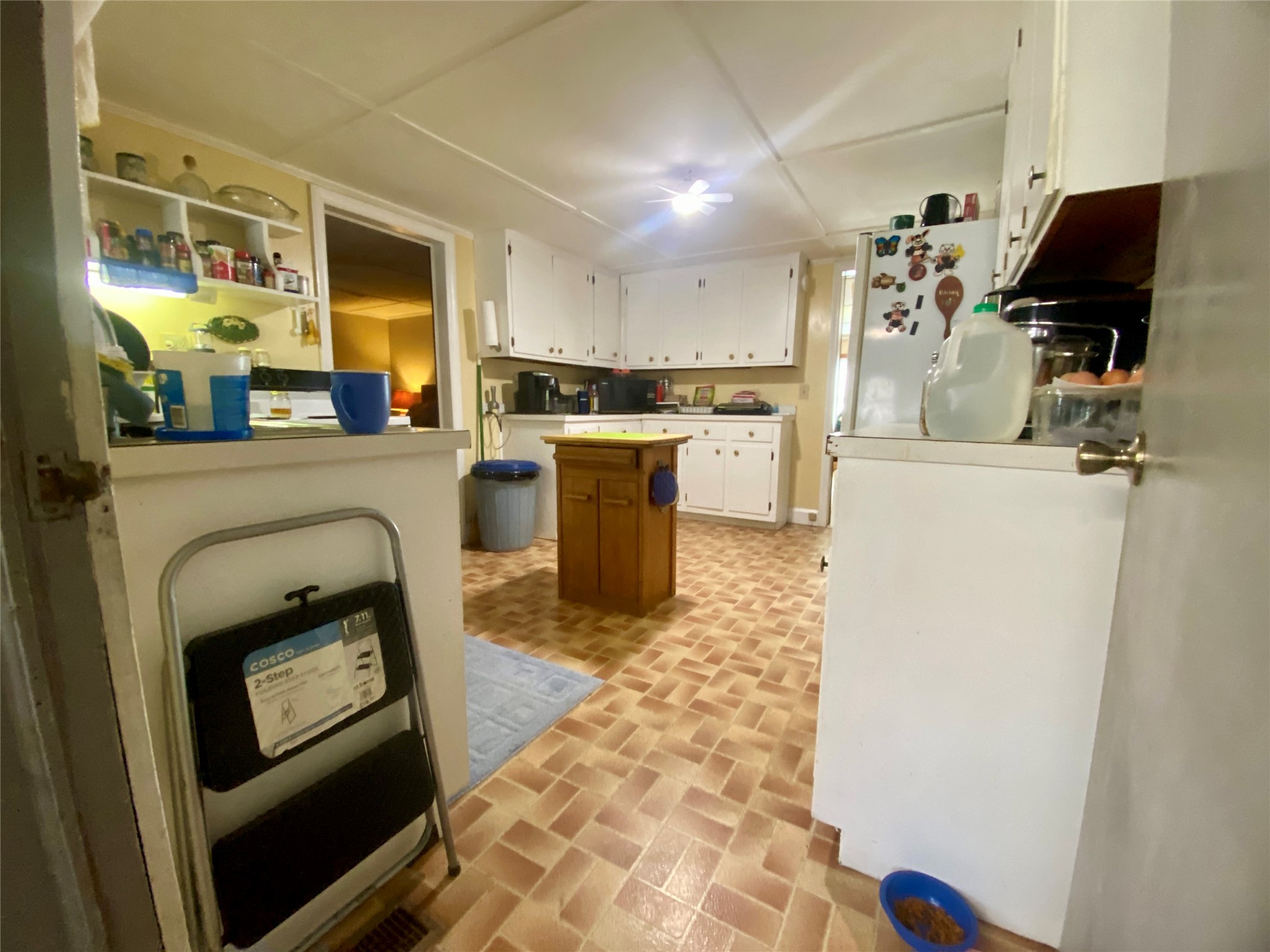 1135 Beaver Dam Road Washington, GA 30673 - Photo 13 of 42 a living room with furniture a flat screen tv and a fireplace