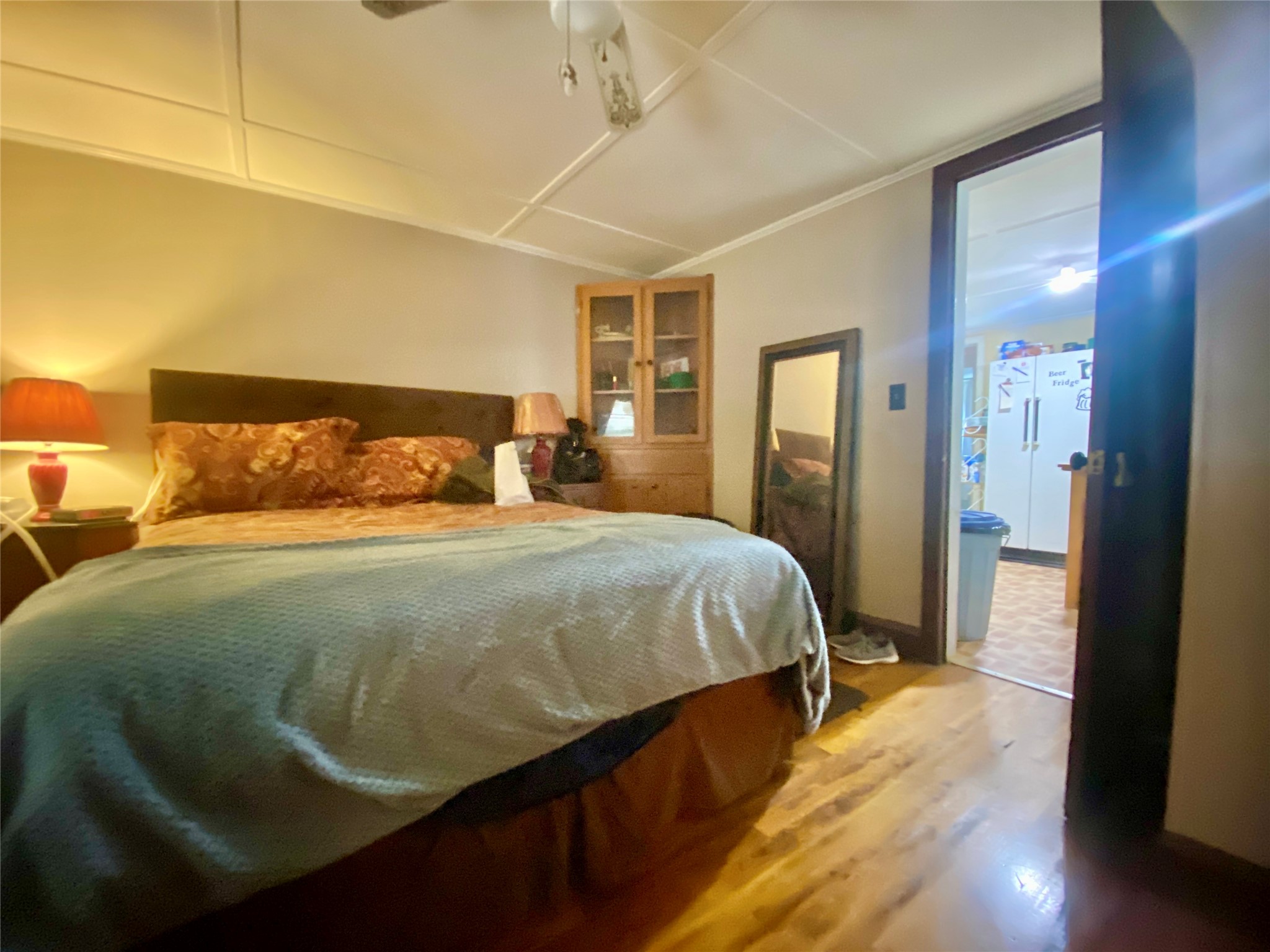 1135 Beaver Dam Road Washington, GA 30673 - Photo 15 of 42 a bedroom with a bed and wooden floor